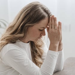 side-view-woman-home-praying